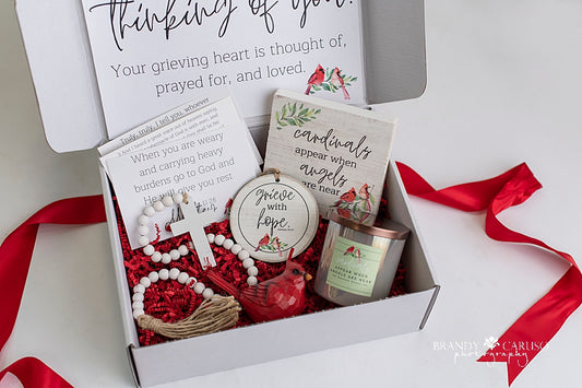 Cardinal themed gift box for grieving hearts. Includes candle, quote ornament and table top wood sign, a cross and Cardinal figurine 