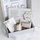 A sympathy gift box of goods for the bereaved heart. Includes a candle, a picture frame, ornament and quote to help anyone who is experiencing loss